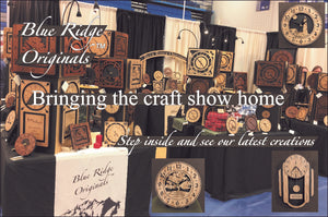 A wide shot of our craft show booth of clocks, with the words, "Blue Ridge Originals. Bringing the craft show home. Step inside and see our latest creations."