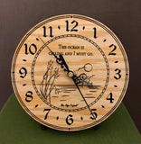 Round oak clock with an ocean scene of sun, birds and ripples in the water along with the words, "The ocean is calling and I must go" lasered in the face - 6.5" size on easel