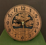 Round walnut clock with a tree and the words, "Patience and persistence are at the heart of every good thing" lasered on face - 6.5" on easel