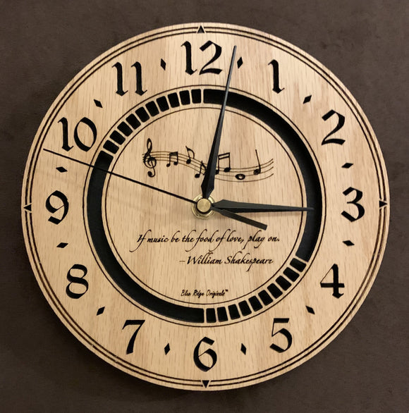 Round oak clock with music notes and the words, 