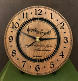 Round walnut clock with music notes and the words, "If music be the food of love, play on" lasered on face - 8" on easel
