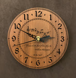 Round walnut clock with music notes and the words, "If music be the food of love, play on" lasered on face - 6.5" size