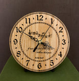 Round oak clock with music notes and the words, "If music be the food of love, play on" lasered on face - 6.5" on easel