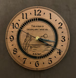 Round walnut clock with an ocean scene of sun, birds and ripples in the water along with the words, "The ocean is calling and I must go" lasered in the face - larger sizes