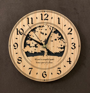 Round oak clock with a tree and the words, "The good we accomplish together becomes a part of us forever" lasered on face - larger sizes