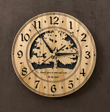 Oak clock with lasered tree and small bird, with the words, "Family gives us roots and wings" - Larger sizes