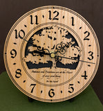 Round oak clock with a tree and the words, "Patience and persistence are at the heart of every good thing" lasered on face - 6.5" on easel