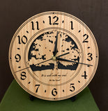 Round oak clock with a tree and the words, "It is well with my soul" lasered on face - 8" on easel