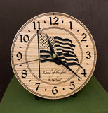 Round oak clock with a lasered American flag and black background with the words "Land of the free"  - 6.5" on easel